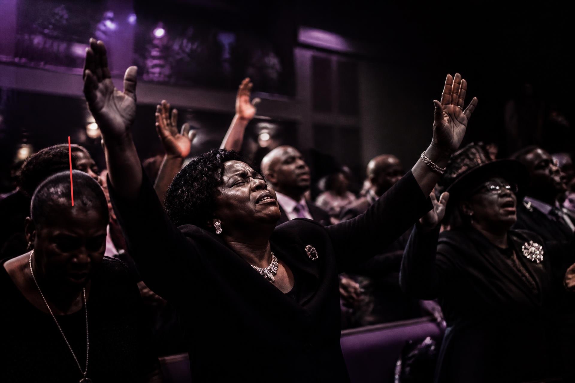 Congregation worshiping at Nehemiah Missionary Baptist Church